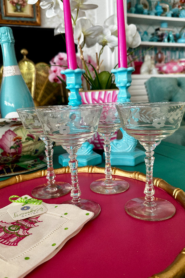 Vintage Champagne Coupes by Libby Sharp styled on a hot pink tray with cocktail napkins and champagne