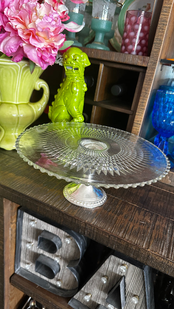 Sterling silver and glass top cake stand with hobnail detail styled on a bar