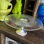 Sterling silver and glass top cake stand with hobnail detail styled on a bar