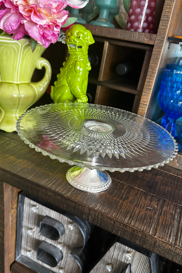 Sterling silver and glass top cake stand with hobnail detail styled on a bar