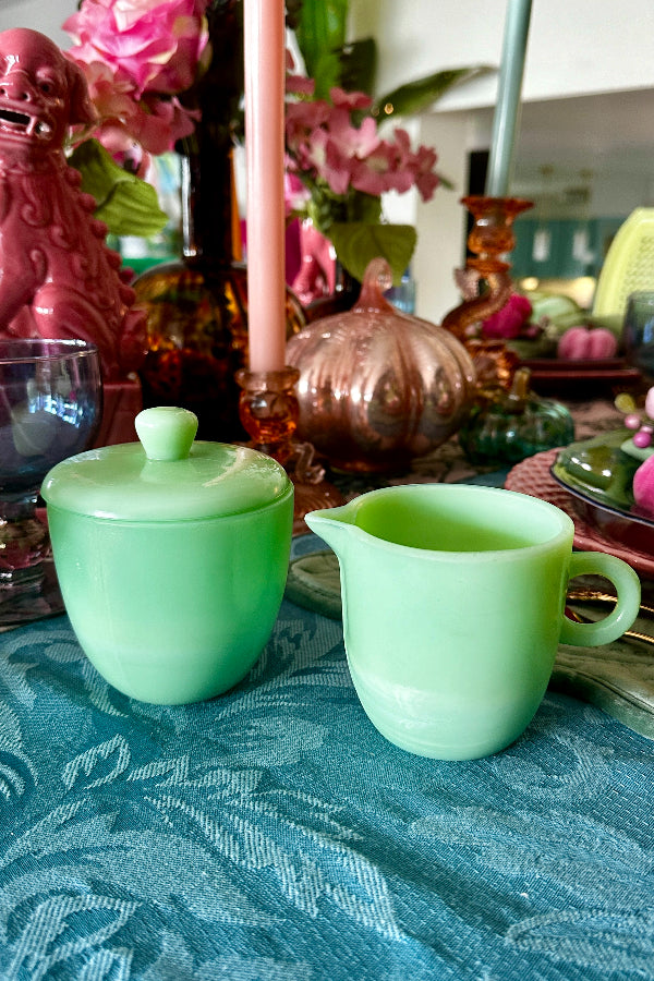 Vintage Jadeite Sugar and Creamer in green with a lid styled on a Fall tablescape