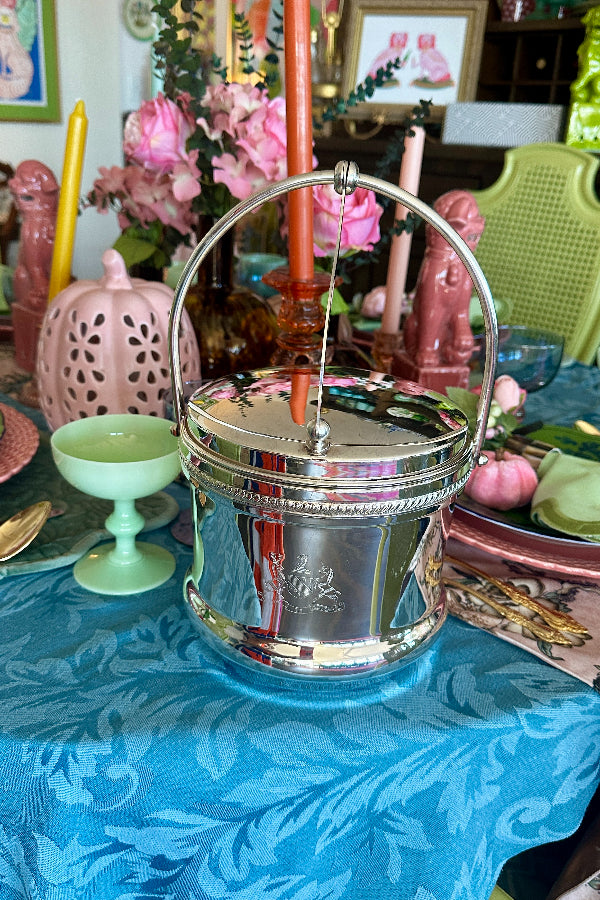 Vintage Silverplate Ice Bucket with a n engraved coat of arms  styled onn a dining tablescape