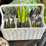 Vintage Wicker Storage Basket- Silverware in white with a handle filled with silverware and napkins in separate compartments styled on a serving bar