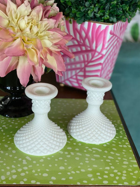 Pair of diamond cut milk glass candleholders