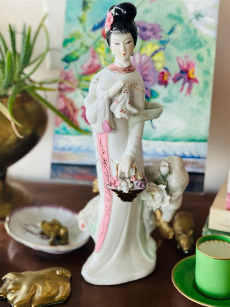 White porcelain Geisha girl with delicate compodimonte flowers and pink and gold accents