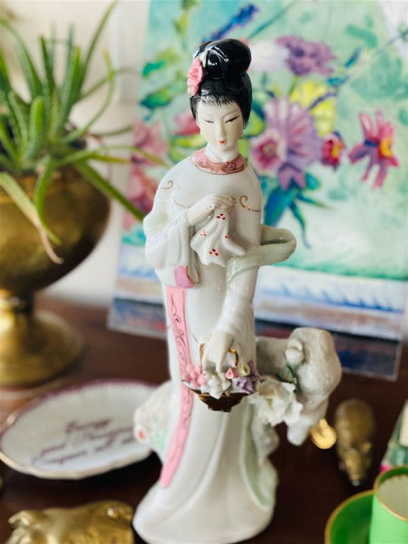 White porcelain Geisha girl with delicate compodimonte flowers and pink and gold accents
